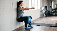 Wall Sits with Ball Squeeze